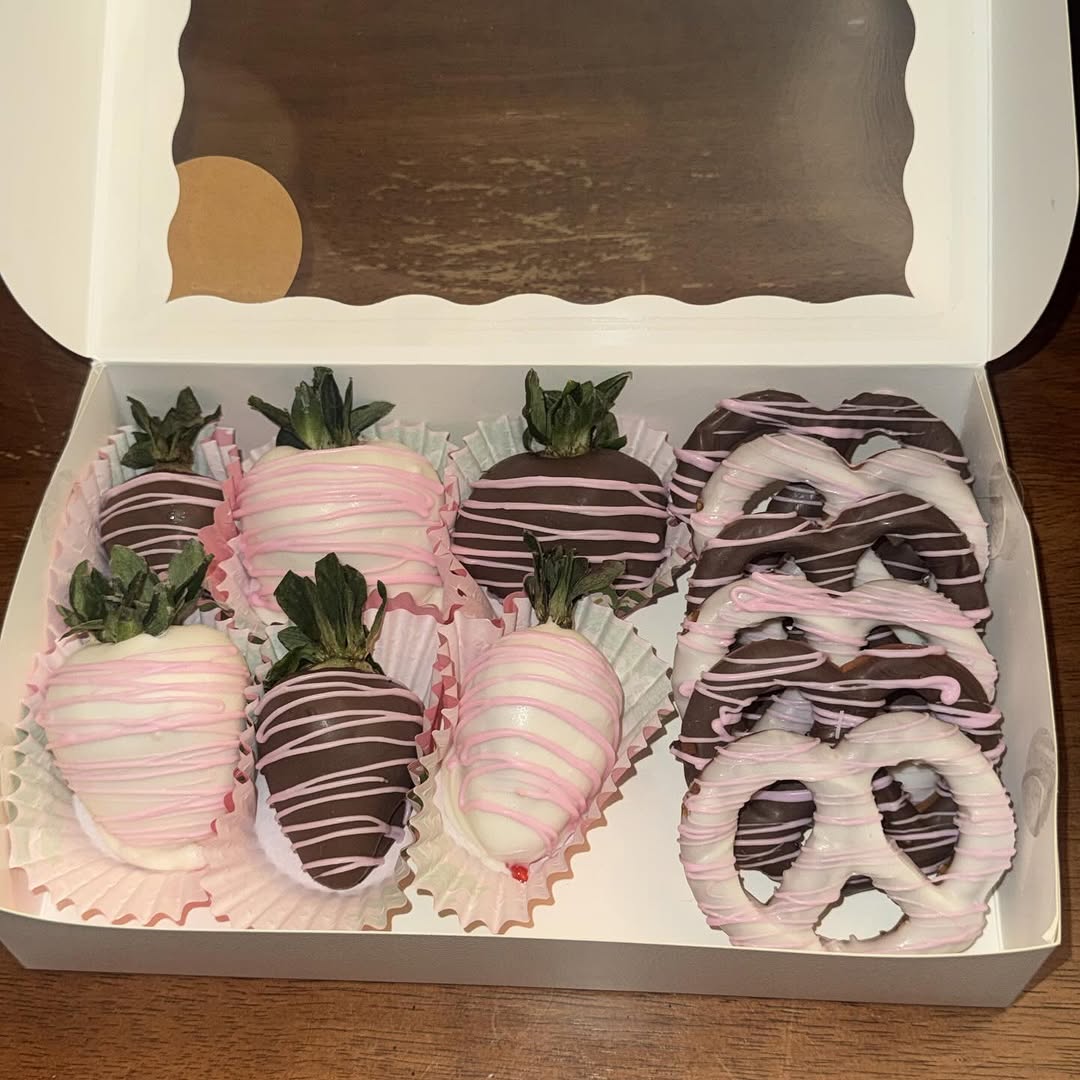 Valentine's mixed box with white and dark chocolate strawberries and pretzels, all accented with pink drizzle for a romantic look.